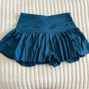 Women’s dark teal gold hinge skirt
